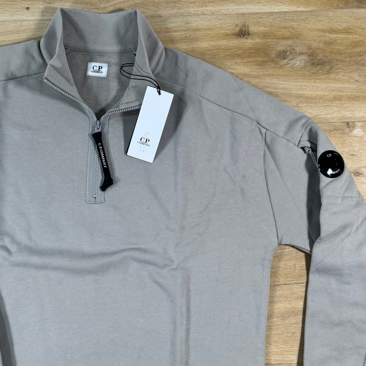 C.P. Company Diagonal Raised Half-Zip Lens Sweatshirt in Dove